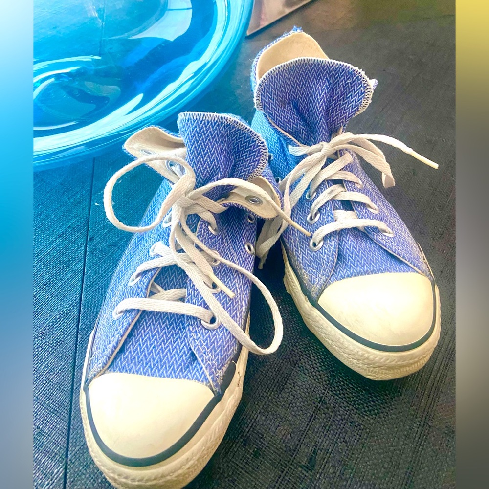 Size 4.5 Blue/ Periwinkle NWOT Converse High tops.
